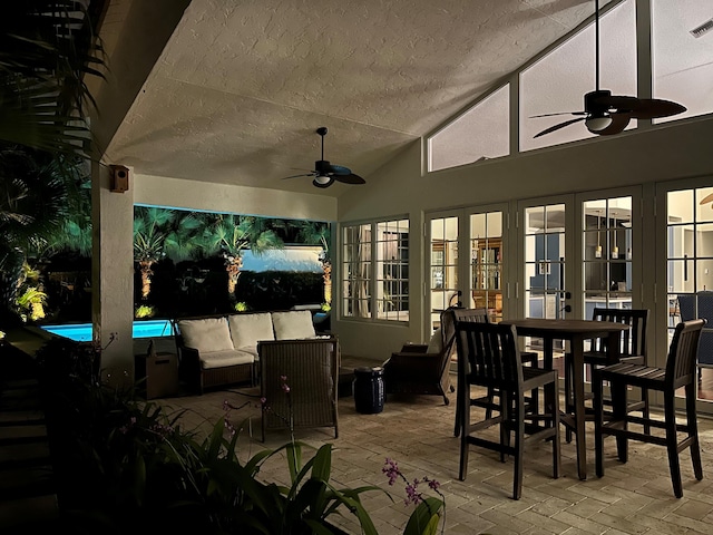 view of patio / terrace featuring outdoor lounge area, ceiling fan, and french doors