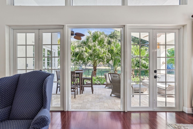 entryway featuring hardwood / wood-style floors and french doors