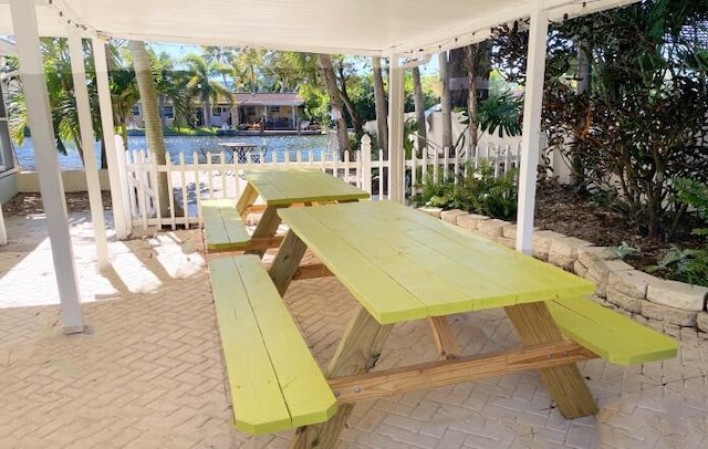 view of patio / terrace with a water view