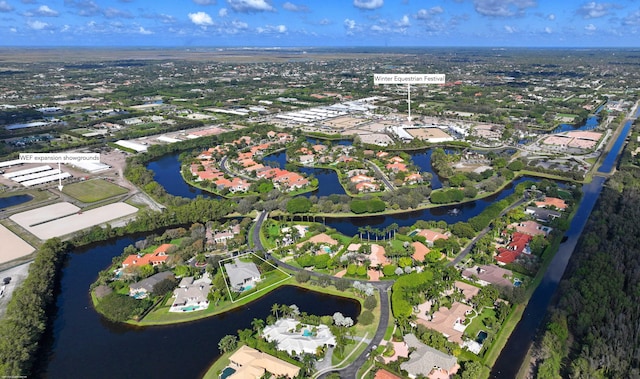 bird's eye view with a water view and a residential view