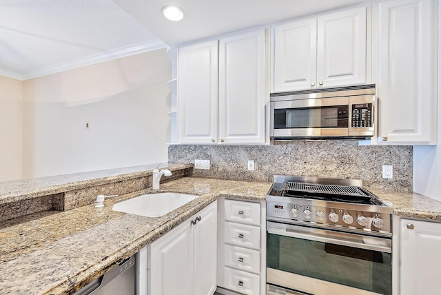 kitchen featuring stainless steel appliances, crown molding, sink, and white cabinets