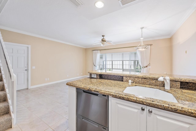 kitchen with dishwashing machine, light stone countertops, sink, and white cabinets