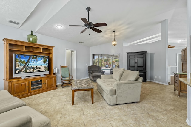 tiled living room with a textured ceiling, vaulted ceiling, and ceiling fan