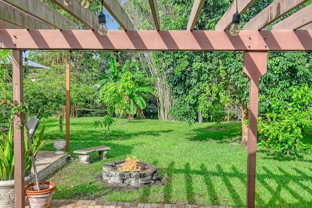 view of yard featuring a fire pit