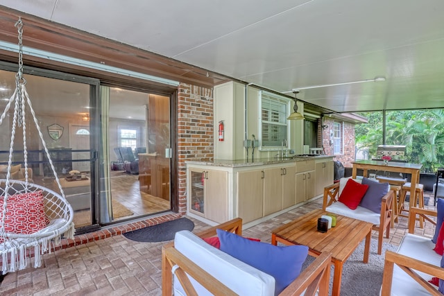 view of patio featuring sink and an outdoor living space