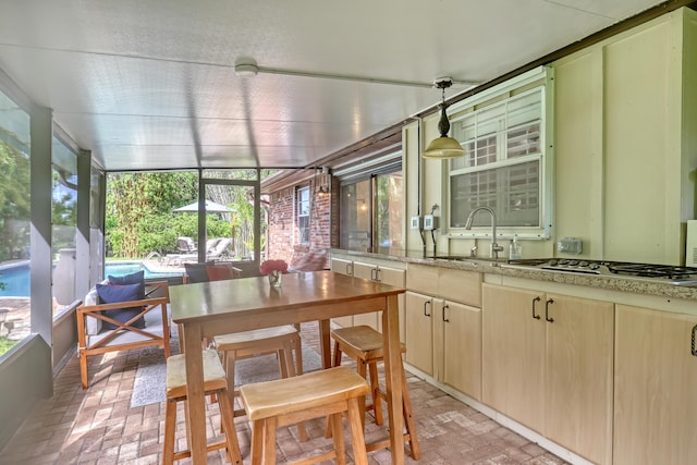 sunroom with sink