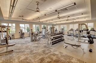 exercise room featuring water heater