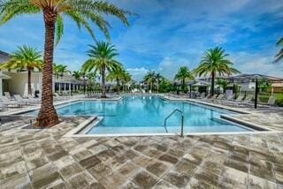 view of pool featuring a patio area