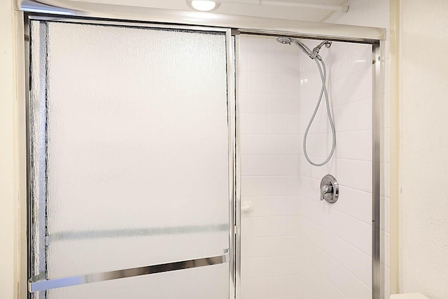 bathroom featuring walk in shower