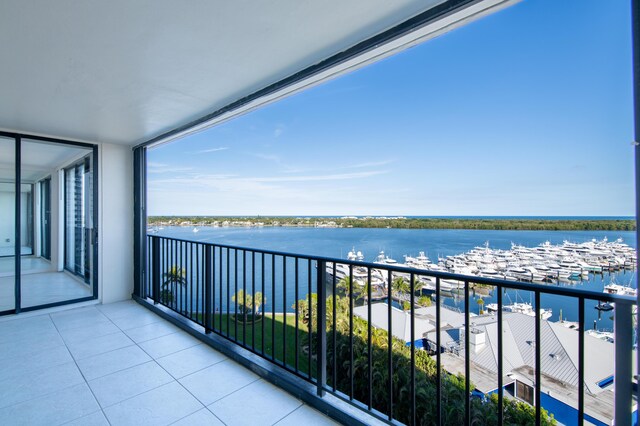 balcony featuring a water view