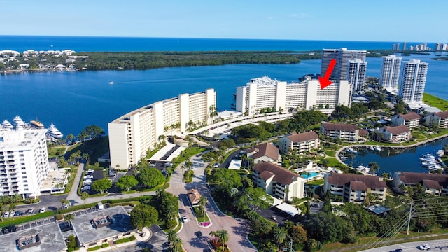 aerial view with a city view and a water view