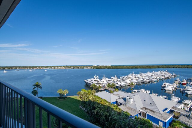 balcony featuring a water view