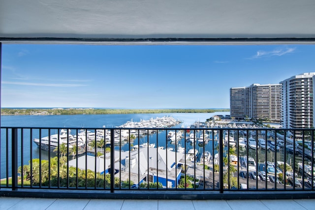 balcony featuring a water view