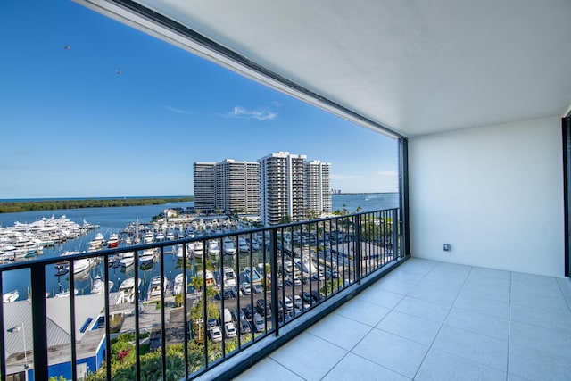 balcony featuring a water view