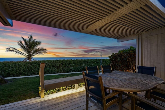 deck at dusk with a water view