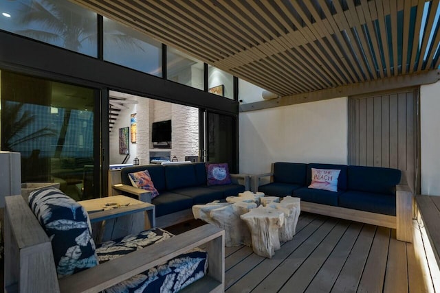 wooden deck featuring an outdoor living space