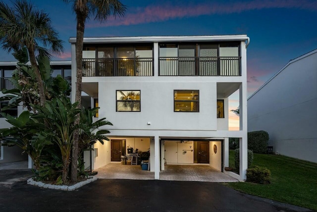 view of front of property with a balcony