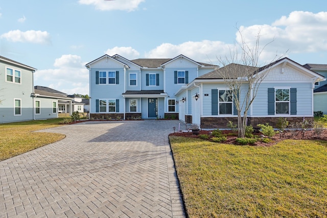 view of front of home with a front lawn