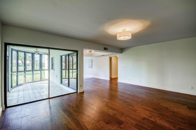 empty room featuring wood-type flooring