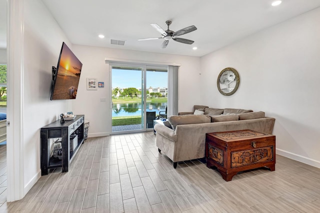 living room featuring ceiling fan