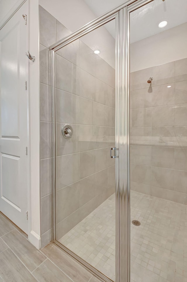 bathroom with an enclosed shower