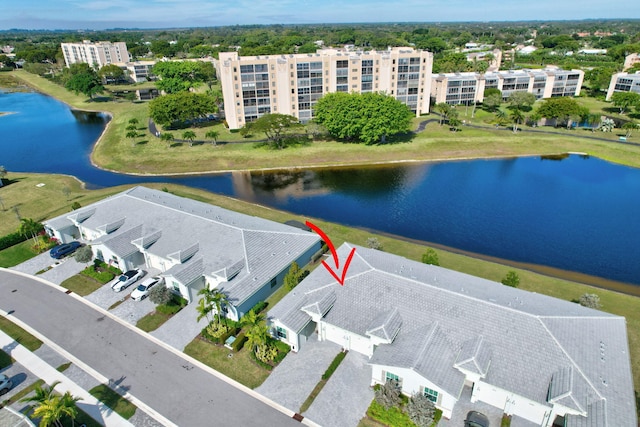 bird's eye view with a water view