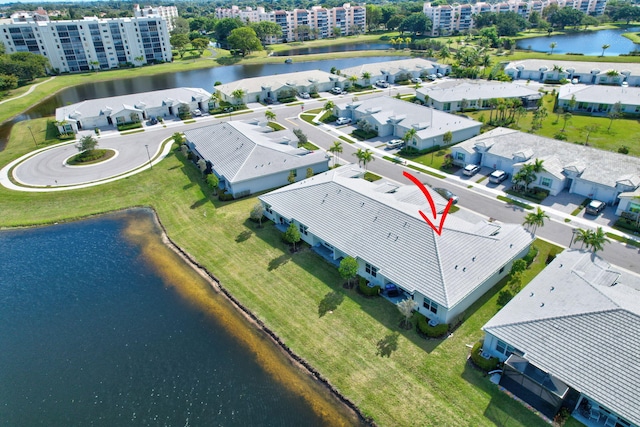 drone / aerial view featuring a water view