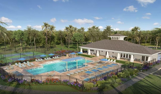 view of swimming pool with a patio area