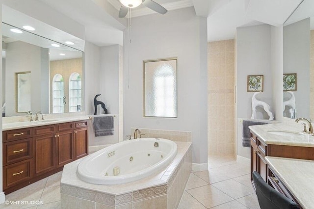 bathroom featuring vanity, tile patterned floors, and tiled bath