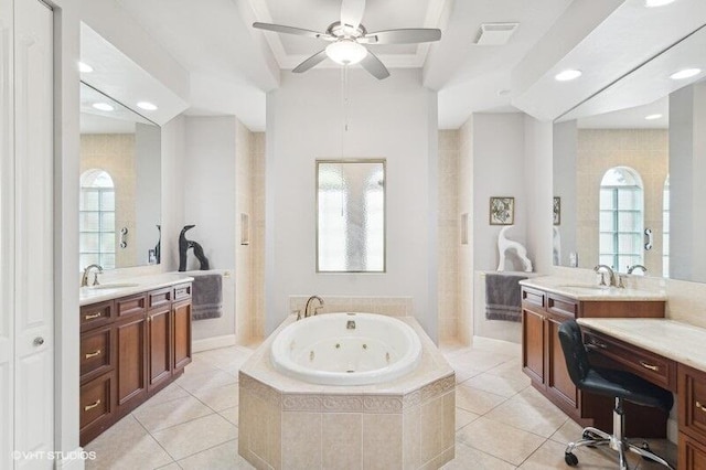 bathroom featuring a relaxing tiled tub, tile patterned floors, vanity, and ceiling fan