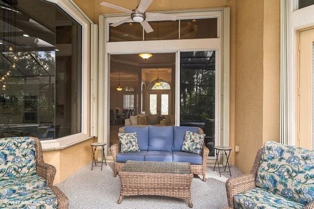 exterior space with ceiling fan and outdoor lounge area