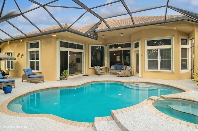 rear view of property featuring an outdoor living space, a pool with hot tub, a patio area, and glass enclosure