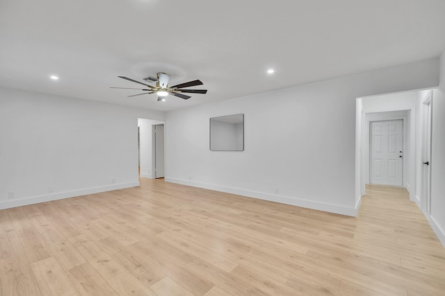 unfurnished room featuring light wood-type flooring and ceiling fan