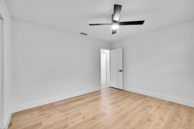 unfurnished room featuring ceiling fan and light wood-type flooring