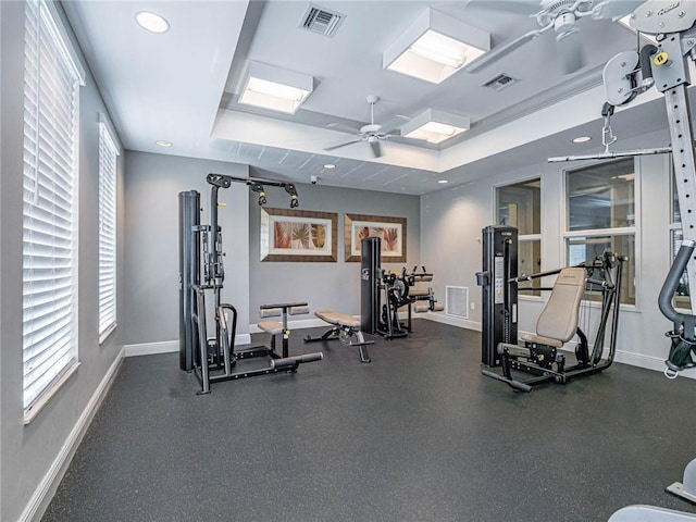 exercise room with ceiling fan