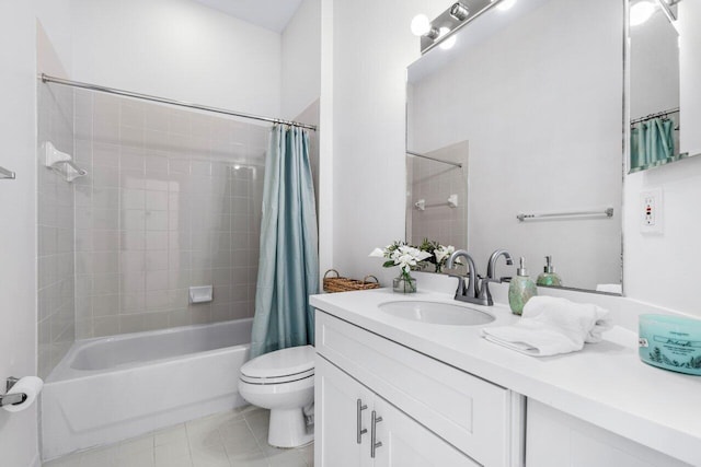 full bathroom featuring tile patterned floors, toilet, vanity, and shower / tub combo