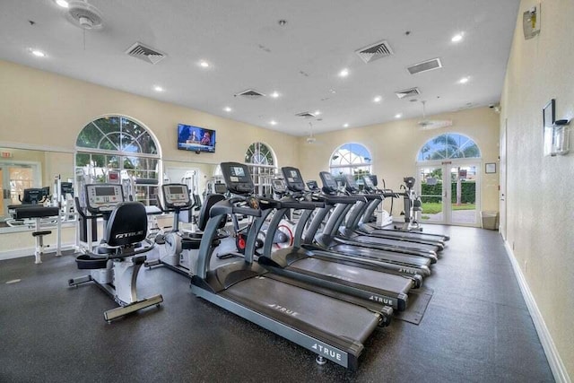 exercise room featuring french doors