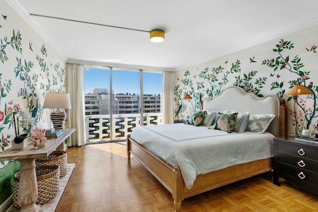 bedroom with access to exterior, floor to ceiling windows, light parquet flooring, and ornamental molding