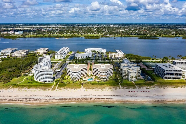 drone / aerial view with a view of the beach and a water view