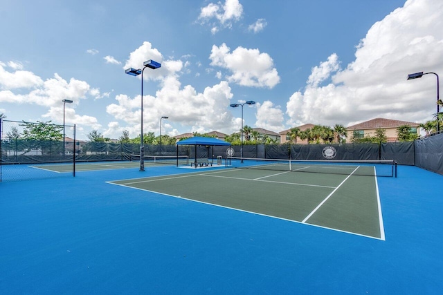 view of tennis court with basketball court