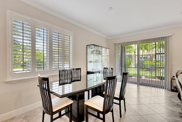 tiled dining space with crown molding