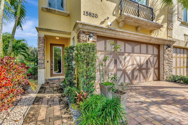 entrance to property featuring a garage