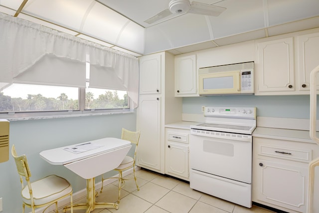 kitchen with white cabinetry, white appliances, light tile patterned floors, and ceiling fan