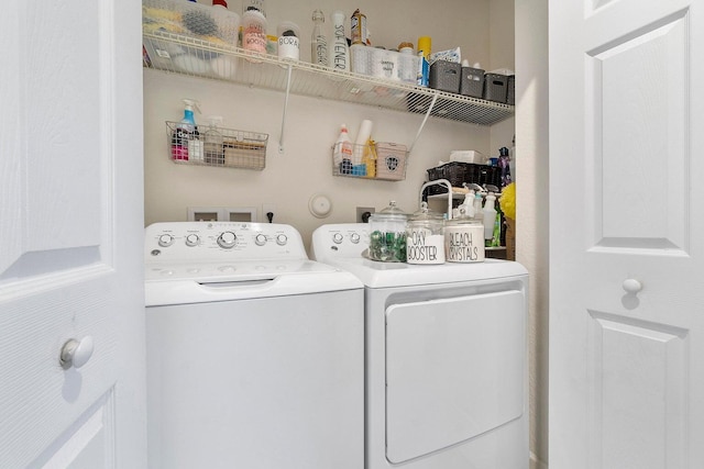 washroom with laundry area and separate washer and dryer