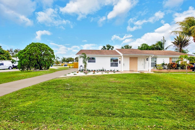 view of front of home with a front yard