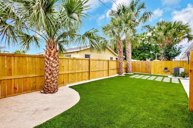 view of yard featuring central AC