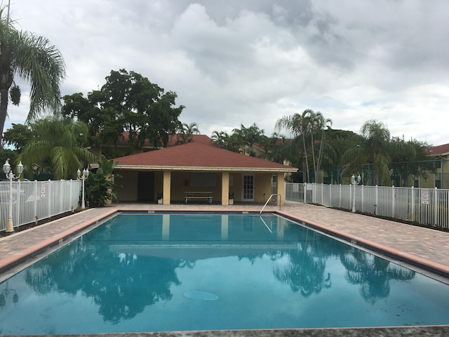 view of swimming pool featuring a patio