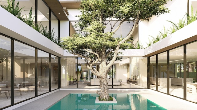 view of swimming pool featuring a patio area