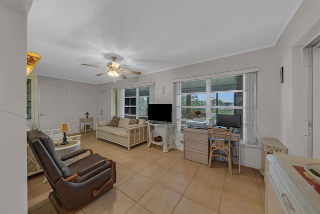 tiled living room featuring ornamental molding and ceiling fan