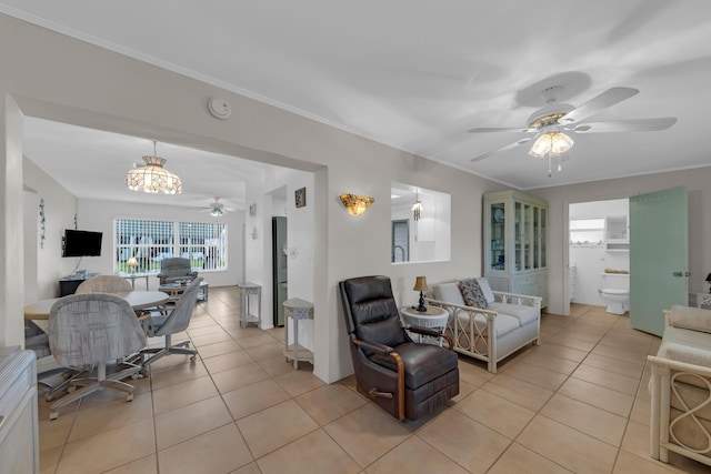 living room with light tile patterned floors and ceiling fan